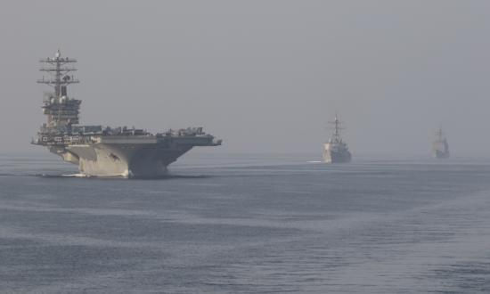 The aircraft carrier USS Nimitz (CVN-68), the guided-missile destroyer John Paul Jones (DDG-53), center, and the guided-missile cruiser Princeton (CG-59), sail in formation during a scheduled transit of the Strait of Hormuz.  Credit: U.S. Navy (Anthony Collier)