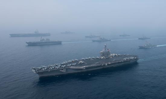 Aerial view of the Carl Vinson Carrier Strike Group and JMSDF conducting training exercises in the sea of Japan