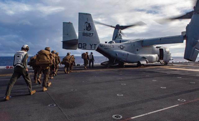 Marines from the 15th Marine Expeditionary Unit board an MV-22 Osprey on the deck of the USS Makin Island (LHD-8). Commandant of the Marine Corps General David H. Berger has called for increased integration between the Navy and Marine Corps, but the integration must flow from a shared understanding of its ends