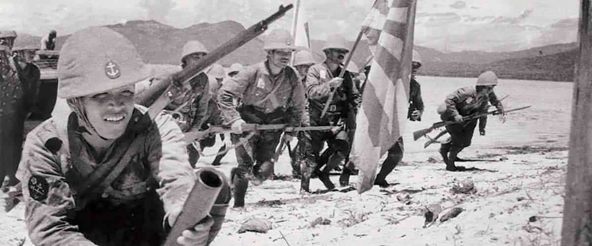 Japanese sailors of a naval guard unit storm ashore 