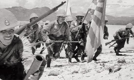 Japanese sailors of a naval guard unit storm ashore 