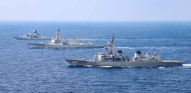 Japan Maritime Self-Defense Force ship Yudachi, the USS Momsen (DDG-92), and the Royal Australian Navy frigate HMAS Arunta 